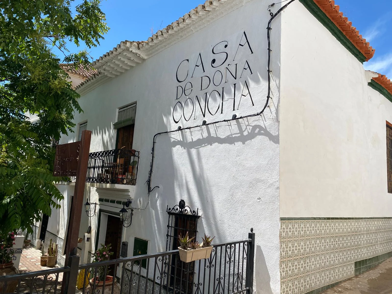 Casa de Doña Concha · Ugíjar, Granada · hand-painted name on the front facade